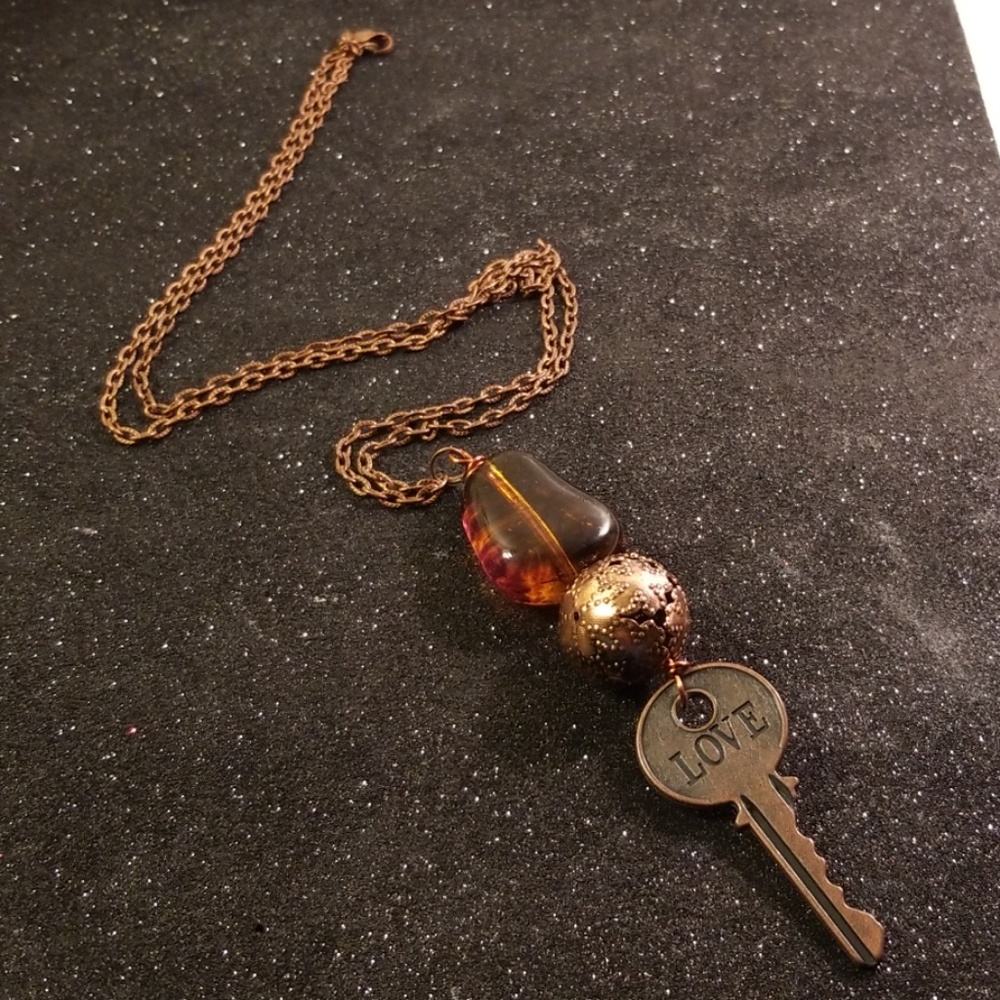 LOVE engraved wording Antique Copper necklace